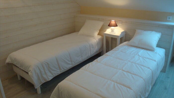 Chambre avec deux lits transformable en 160x200Photo_4.JPG Le clos des lacs